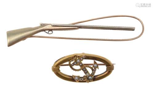 An early 20th century gold coloured and seed pearl anchor brooch