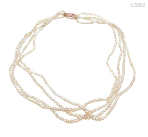 A four row natural pearl necklace