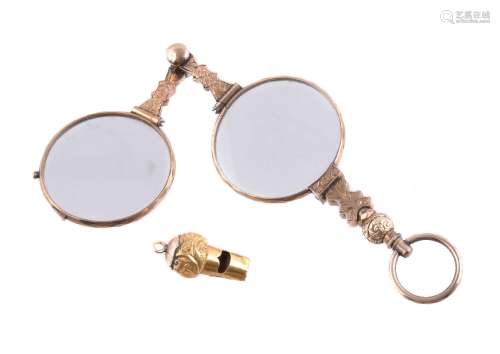 An Edwardian gilt metal lorgnettes; and a small gold coloured whistle