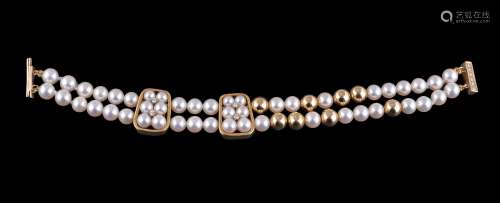 A cultured pearl and diamond bracelet by Mikimoto