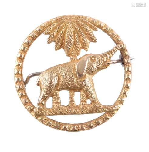 A first half of the 20th century gold coloured elephant and palm brooch