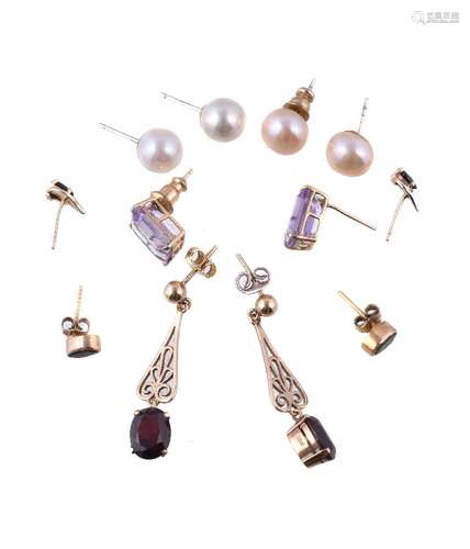 A collection of earrings