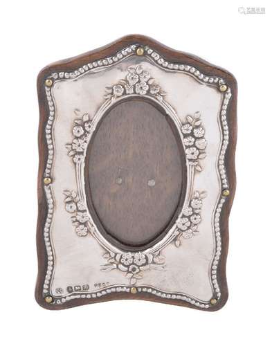 A silver small photograph frame by Boots Pure Drug Co.