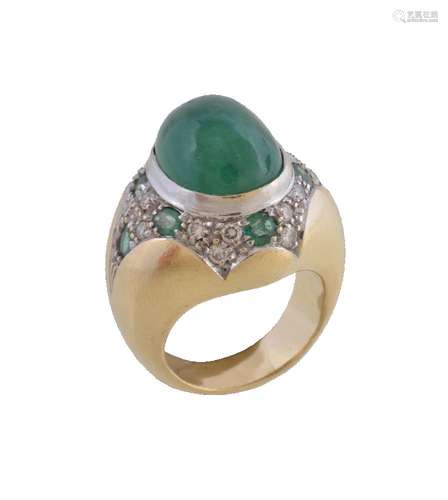 An emerald and diamond dress ring