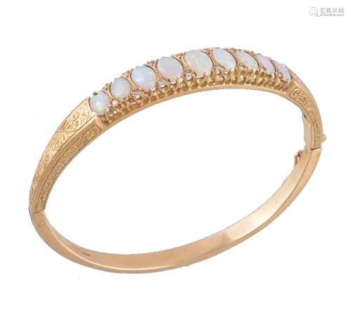 An 18 carat gold opal and diamond hinged bangle