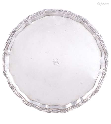 A silver shaped circular salver by The Goldsmiths & Silversmiths Co. Ltd
