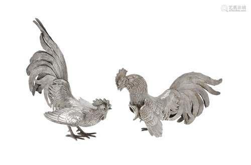 A pair of Continental silver cockerels