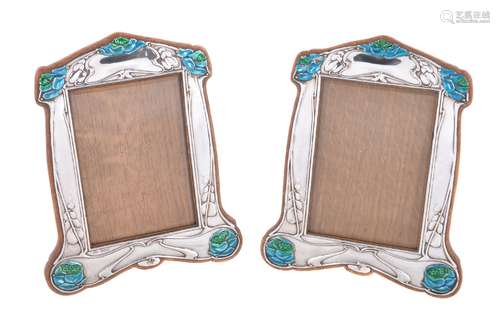 A matched pair of Art Nouveau silver photograph frames