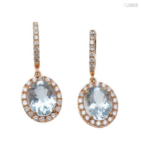 A pair of aquamarine and diamond earrings