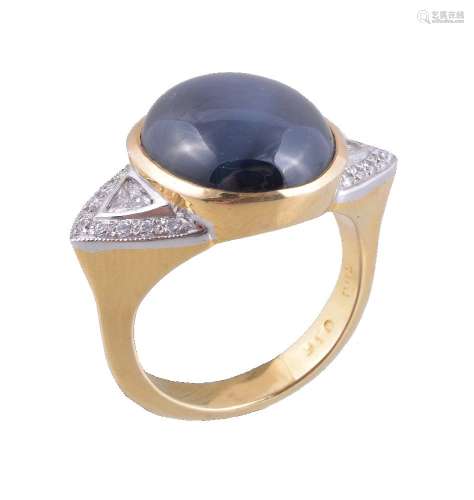 A synthetic star sapphire and diamond ring