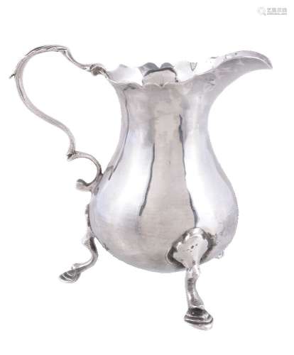 A late George II silver baluster cream jug by Walter Brind