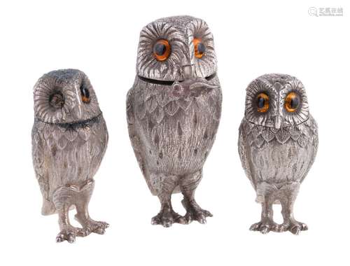 A silver novelty three piece owl cruet set by Richard Comyns