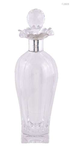 A silver collared moulded glass decanter and stopper