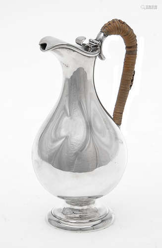 An Edwardian silver baluster ewer by Harman & Co.