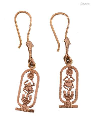 A pair of Egyptian gold coloured earrings