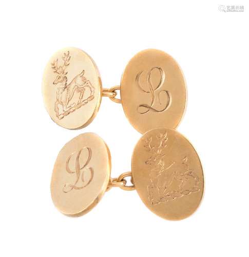 A pair of 18 carat gold double sided cufflinks