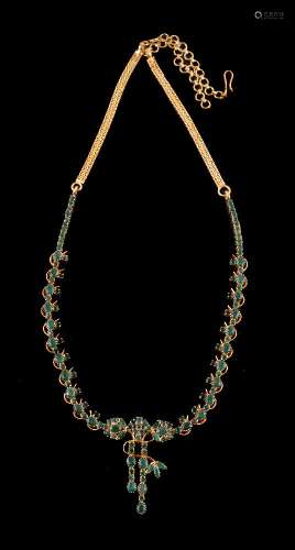 An Indian gold coloured emerald necklace