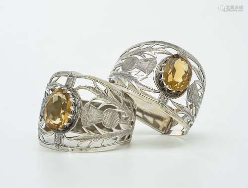 [Scottish market] A pair of silver and citrine D-section napkin rings by Joseph Cook & Son