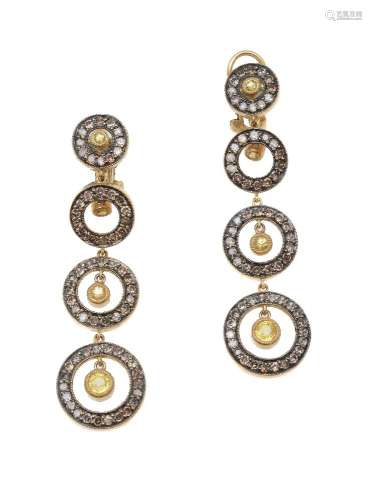 A pair of diamond and yellow sapphire earrings