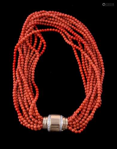ϒ A multi strand coral bead necklace