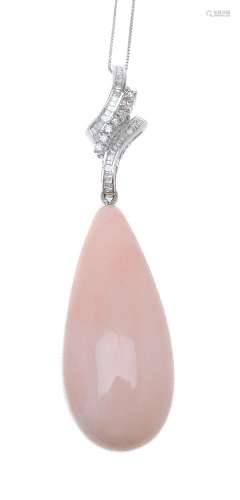 ϒ A coral and diamond pendant