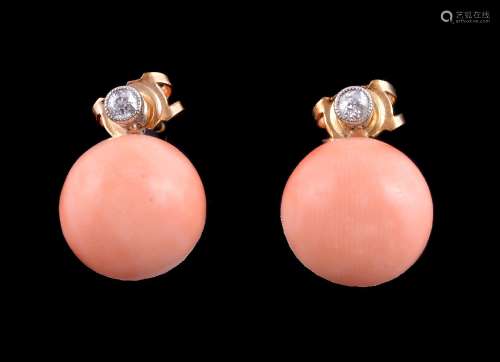 ϒ A pair of coral and diamond earrings