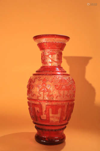 AN OLD COLOURED GLASS VASE