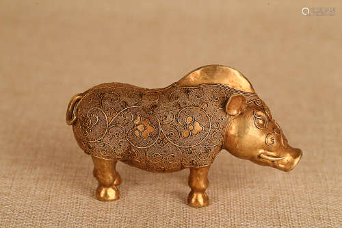 7-9TH CENTURY, A CARVED GILT BRONZE RHINOCERO STATUE, TANG DYNASTY