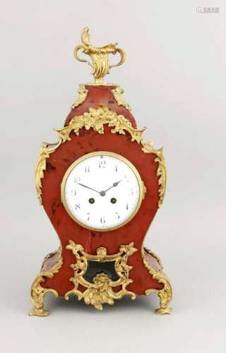 Mantel clock in a wooden case with detachable upper