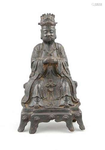 A Chinese bronze-cast figure of a seated male,