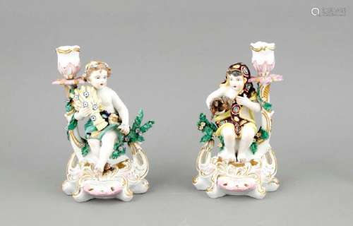 A pair of putto candlesticks, England, probably