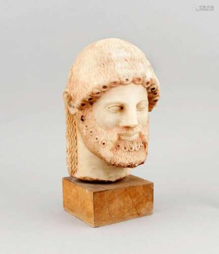 Marble bust in the archaic Greek style, smiling man's