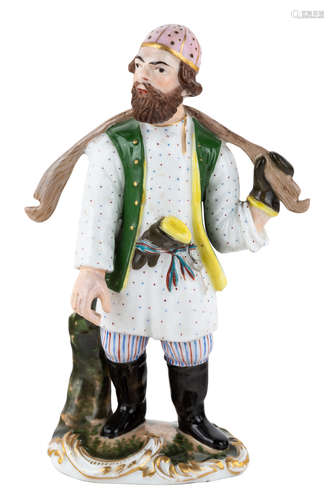 A RUSSIAN PORCELAIN FIGURE OF A WATER CARRIER, KORNILOV BROTHERS PORCELAIN FACTORY, 1840S-1860S