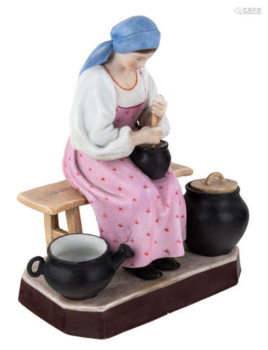 A RUSSIAN PORCELAIN FIGURE OF A PEASANT WOMAN COOKING, GARDNER PORCELAIN FACTORY, LATE 19TH C