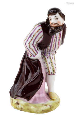 A RUSSIAN PORCELAIN COMMEDIA DELL'ARTE FIGURE OF PANTALONE, GARDNER PORCELAIN FACTORY, MOSCOW, 1830S