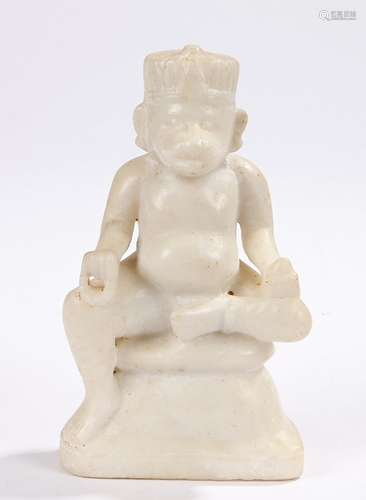 White marble carving depicting Hanuman, seated on a plinth, 20cm high