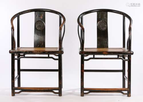 Pair of Hangzhou horseshoe armchairs, with arched backs and carved medallion above a woven seat