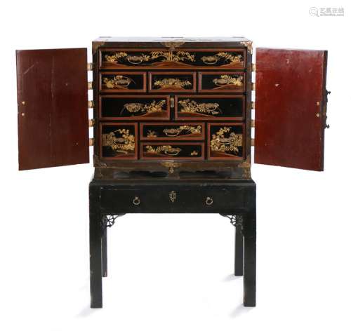 Fine Japanese Edo period black lacquer and gilt decorated cabinet on stand, the rectangular top with