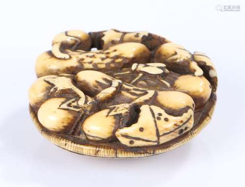 Japanese Edo period Manju netsuke, the ivory netsuke carved as vegetables with a fly in a basket,