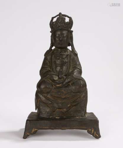 Possibly Shunzhi period Chinese bronze figure of Guan Yin seated cross legged and holding a