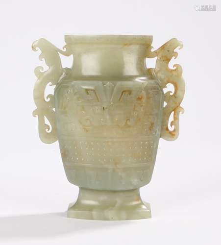 Chinese jade vase, with pierced scrolled handles flanking the scroll and bead decorated body, raised