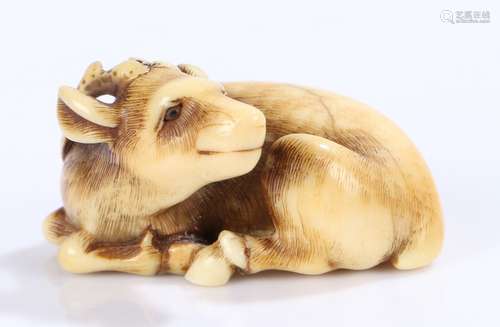 Japanese Edo period ivory netsuke, carved as a reclining Ransen deer, signed to the base, 40mm long