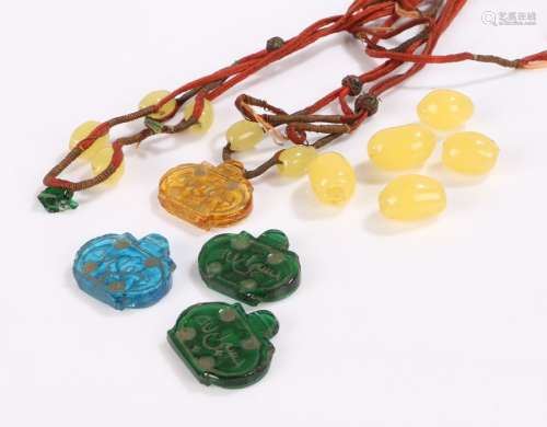 Islamic necklace, with glass and amber effect beads to the stands, AF
