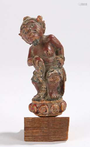 19th Century Balinese figure, polychrome painted as a bearded figure standing on a base, 12cm high