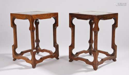 Pair of Chinese hardwood and marble stands, with an inset circular marble top within the square