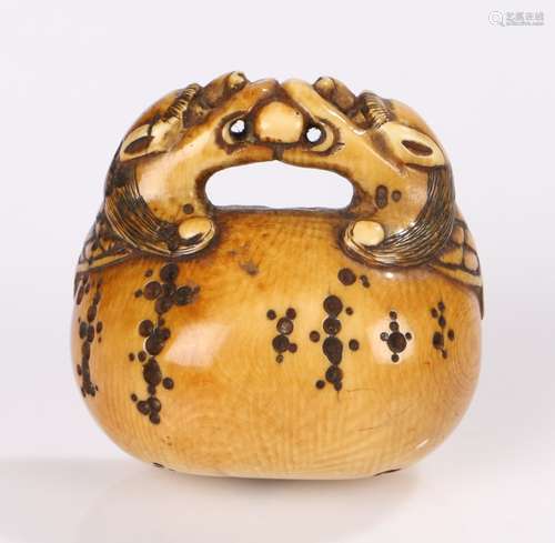 Japanese Meiji period netsuke, the ivory netsuke carved as a Buddhist gong, the two dragons with a