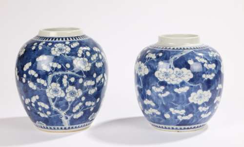 Two 19th Century Chinese blue and white ginger jars, with prunus blossom decoration, one with four