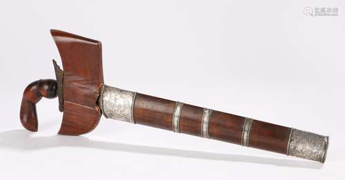 19th Century Balinese Kris, with a carved grip and wide shoulder with white foliate decorated mounts