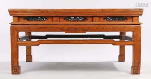 Chinese low centre table, the square top above a carved fret frieze and shaped stretchers uniting