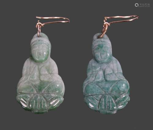 Pair of jade earrings, each carved as Buddha with a yellow metal loop, 37mm high